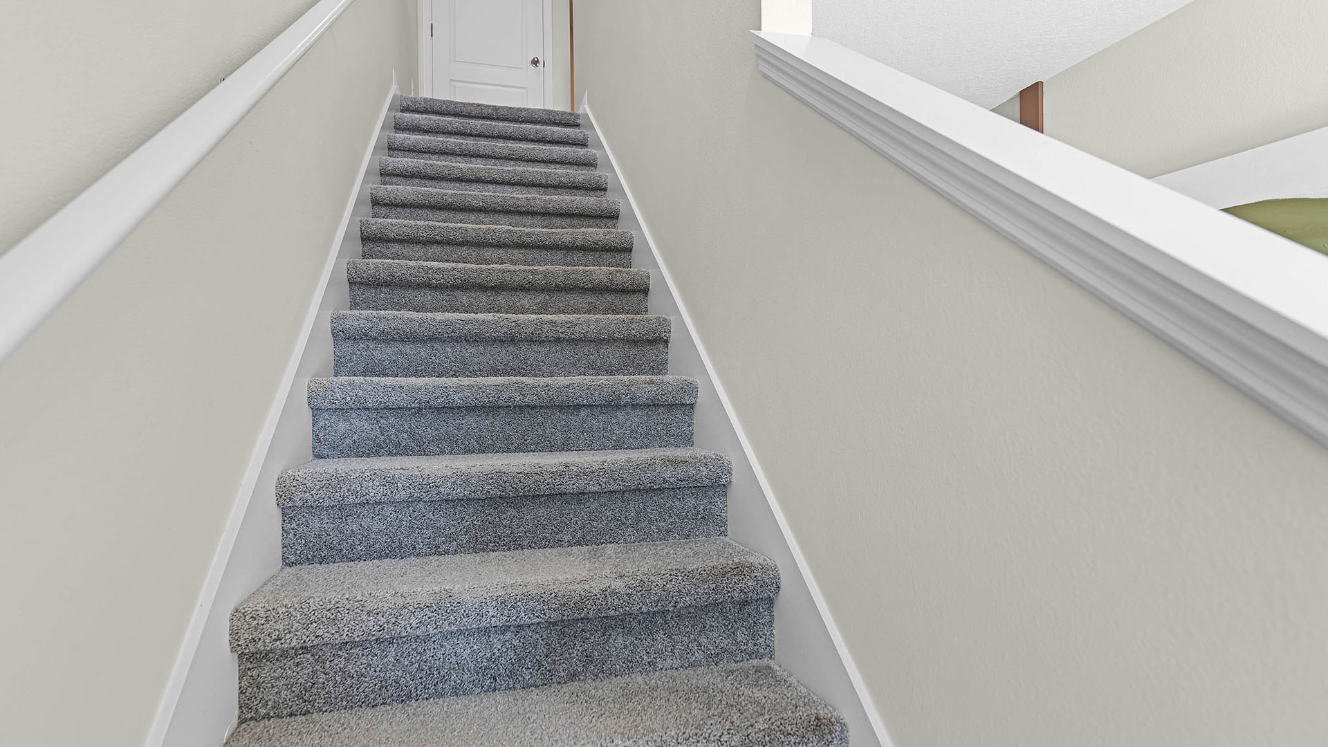 Stairway leading to second story of the home.