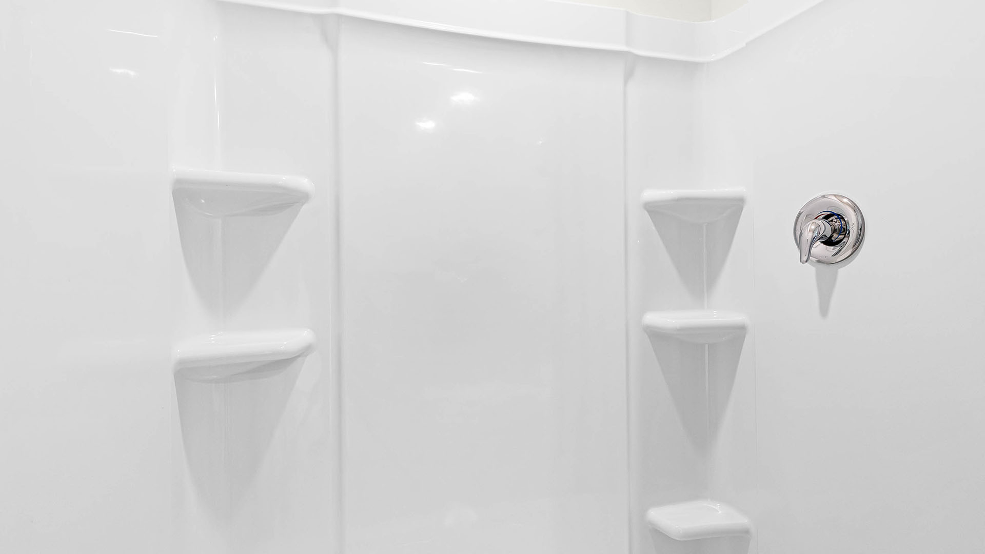 Bathroom with sink, counter space and walk in shower.