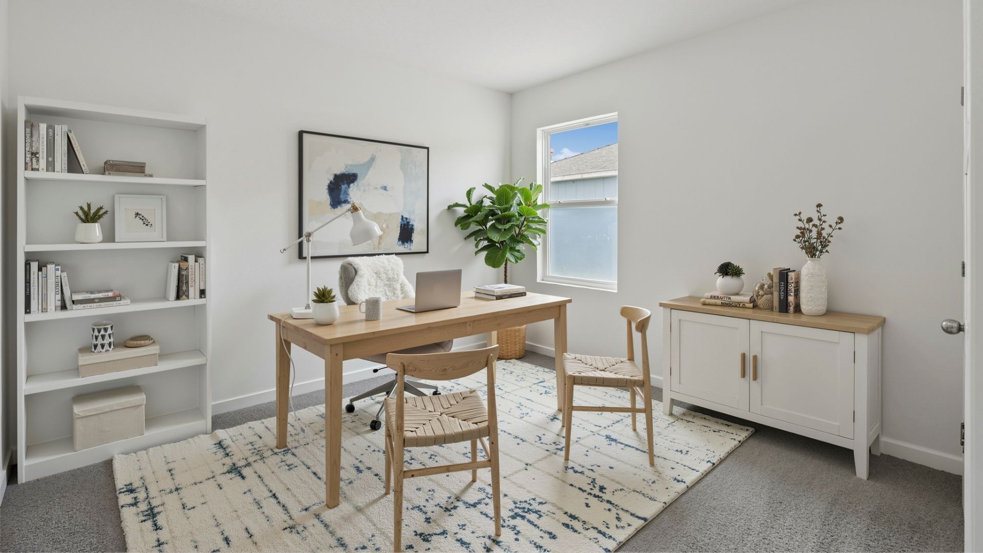 Office with desk, shelves and carpet
