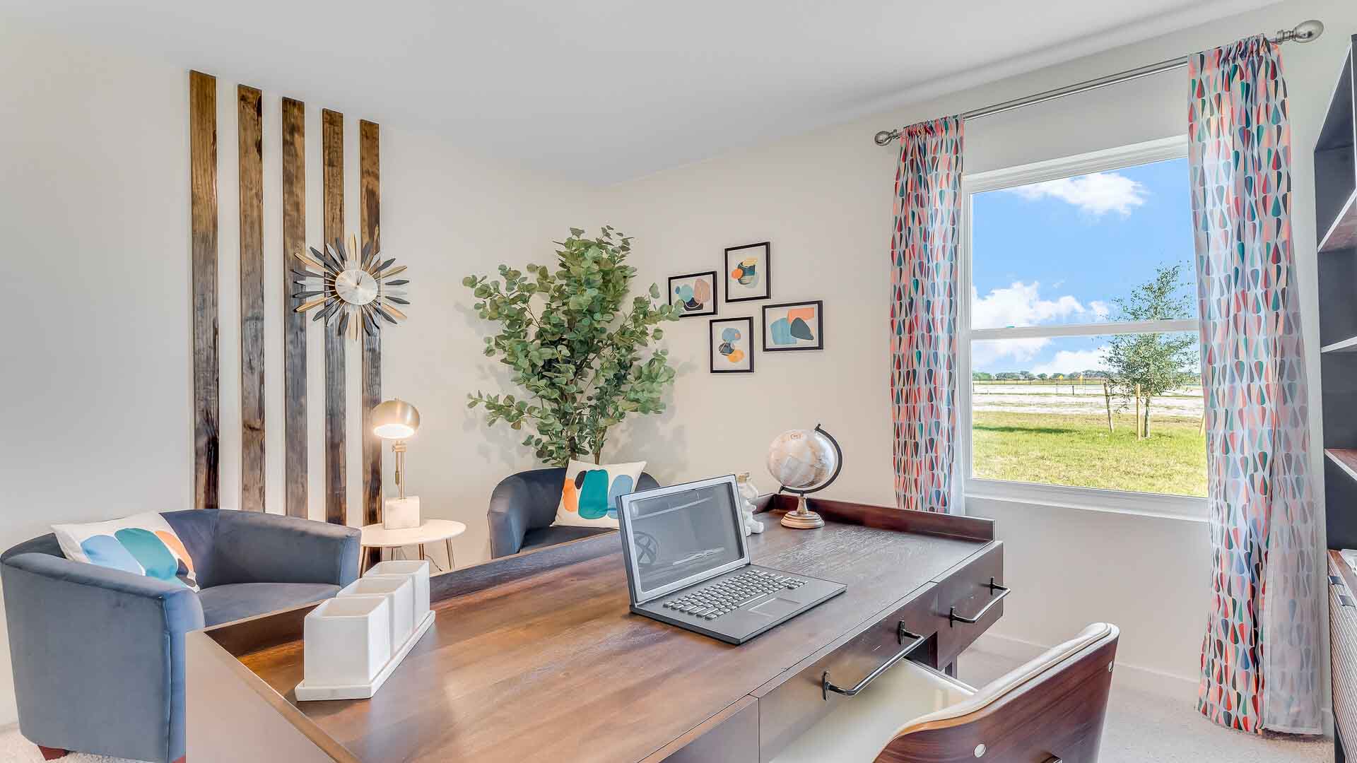 Functional home office with desk, chairs and space to work or play.