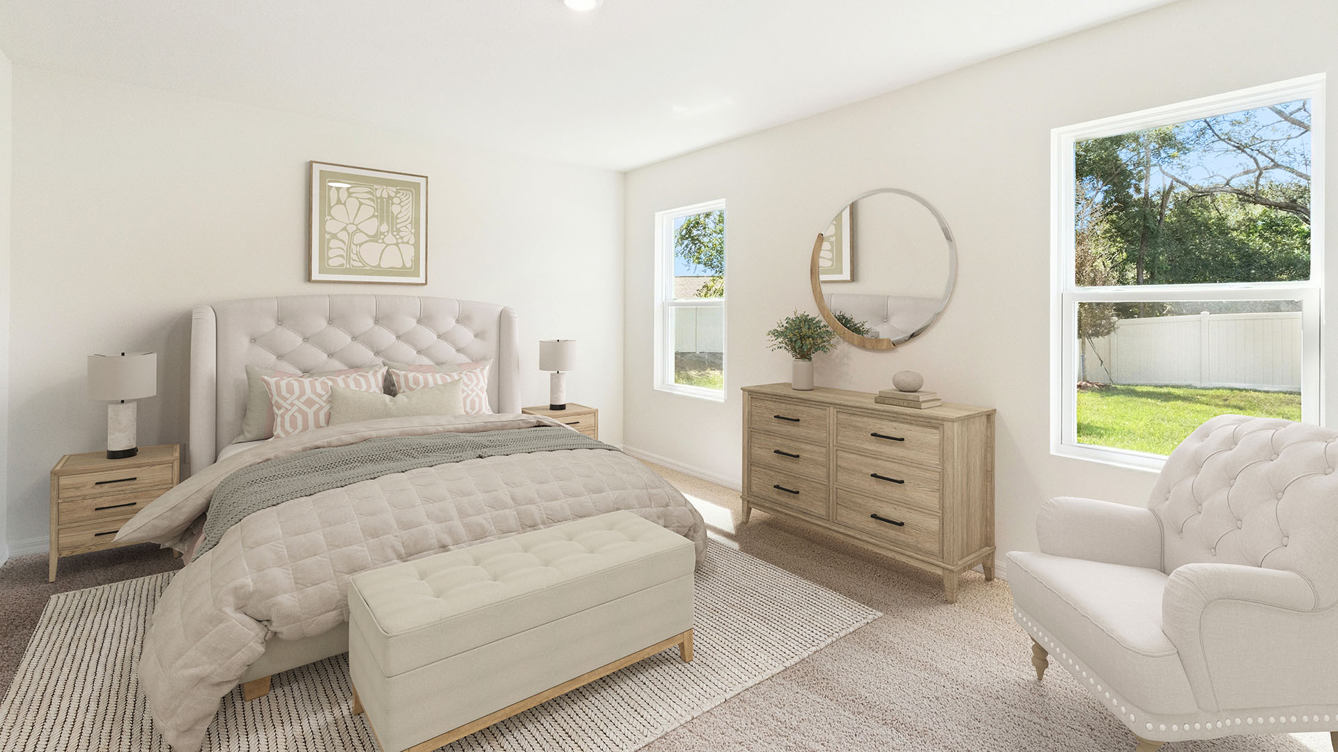 Spacious primary bedroom with king size bed, carpet flooring, natural lighting.