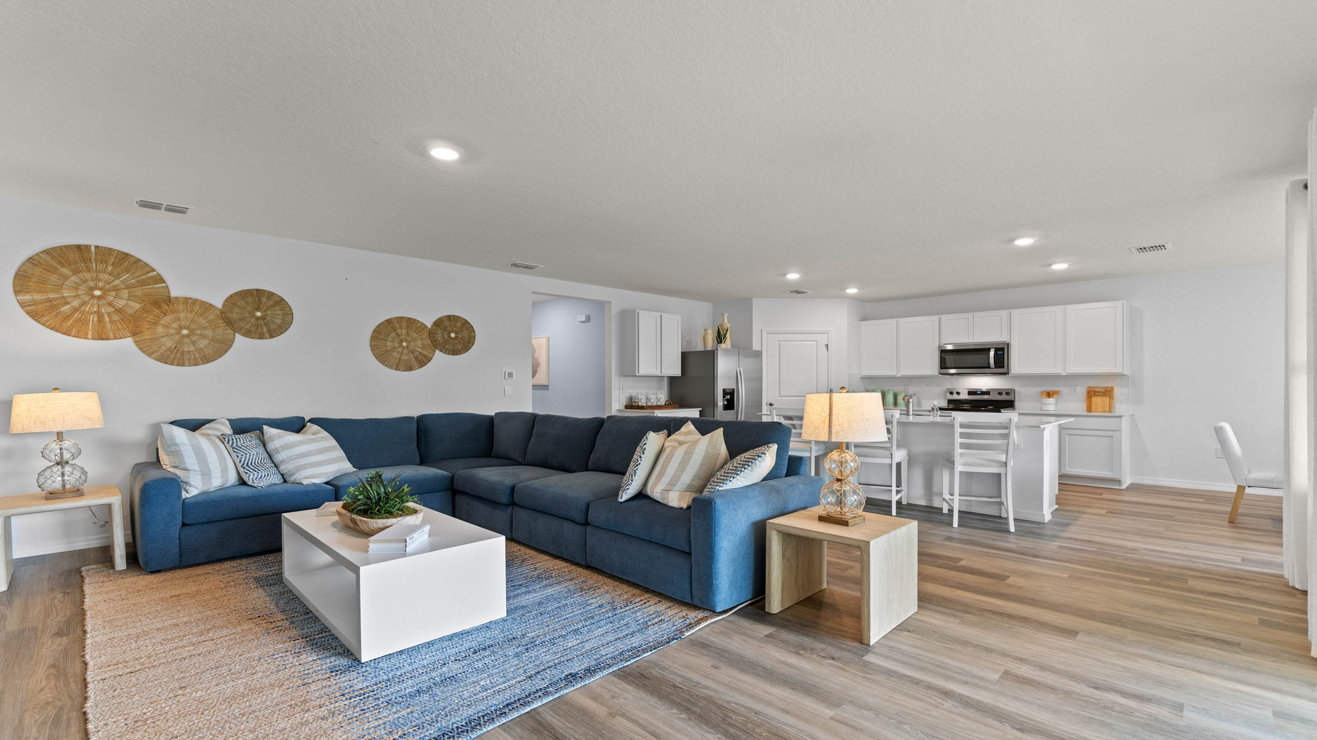 Living area with laminate Flooring and seating