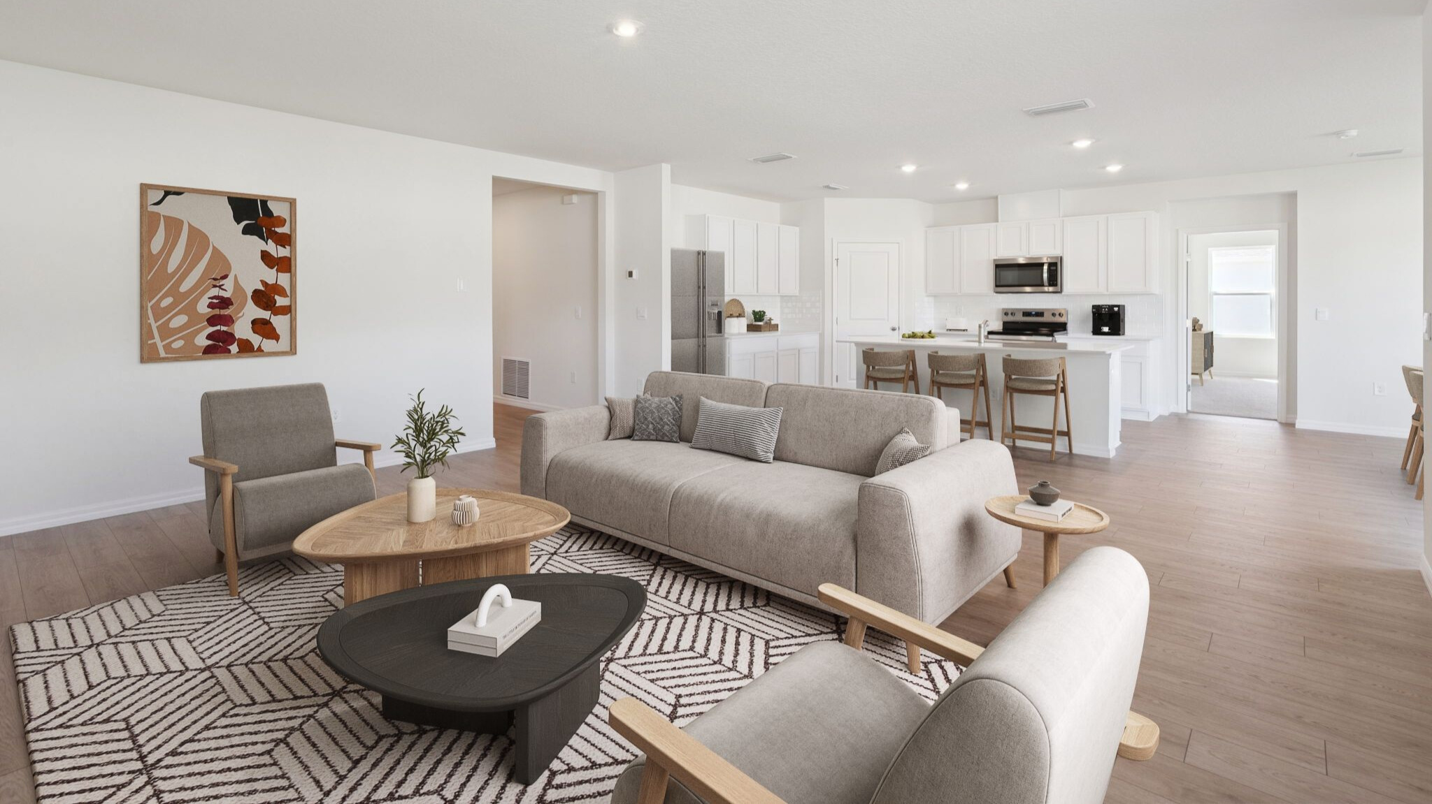 Living area with couch seating, entertainment system and natural lighting