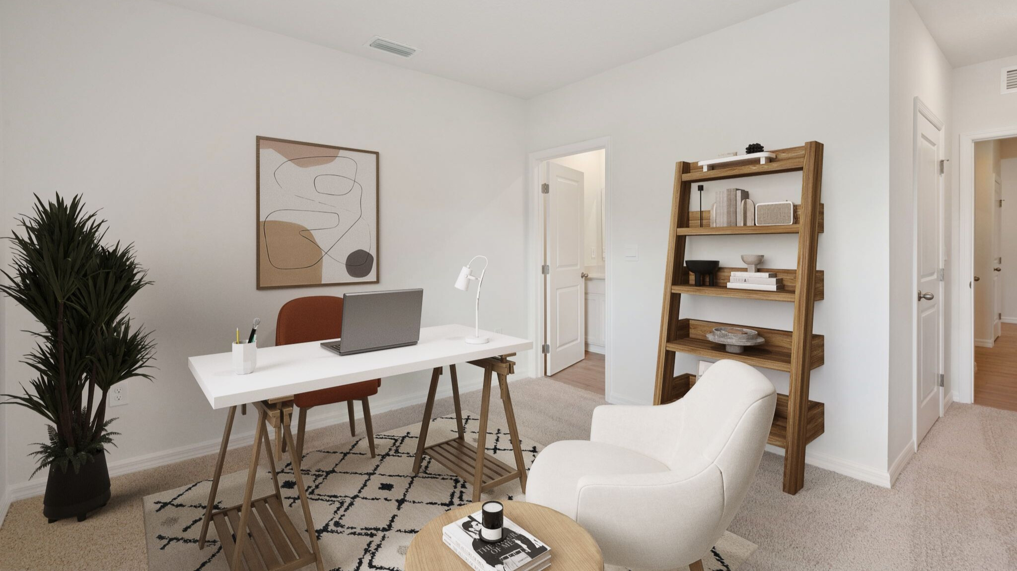 Living area with couch seating, entertainment system and natural lighting