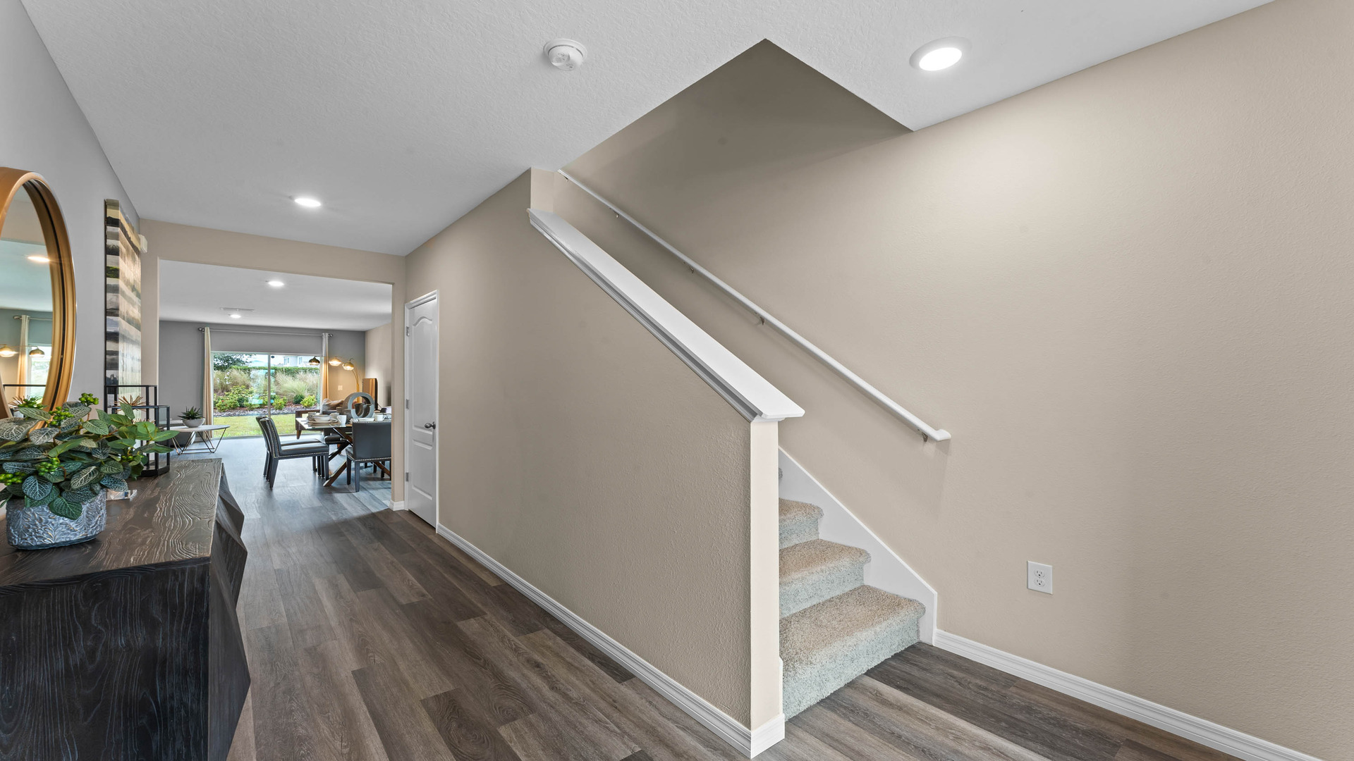 Home entry way through the front door with laminate flooring