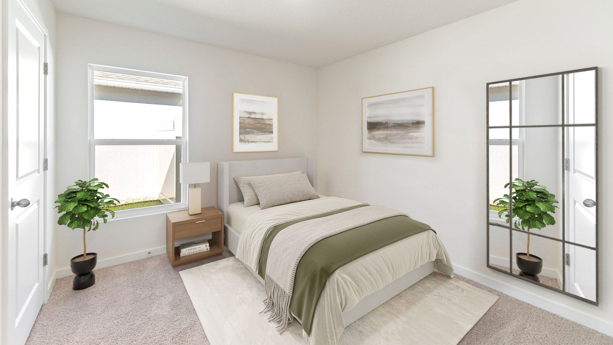 Spacious primary bedroom with king size bed, carpet flooring, natural lighting.