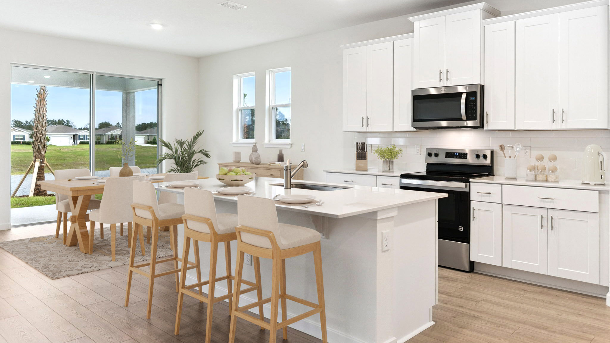 kitchen with quartz countertops overseeing living area and dining room table