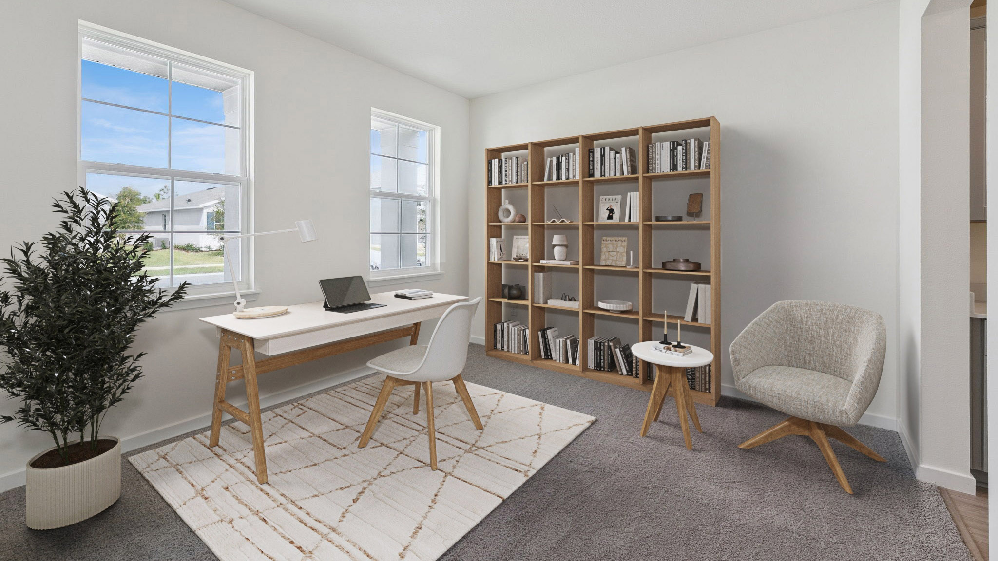 Functional home office with desk, chairs and space to work or play.