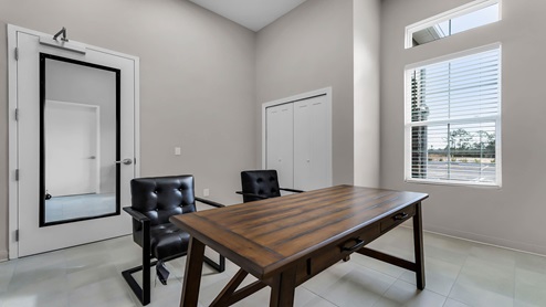 Community clubhouse with gated access, fitness and gathering areas.