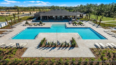 Aerial view of the community amenity area with blue skies and sidewalks