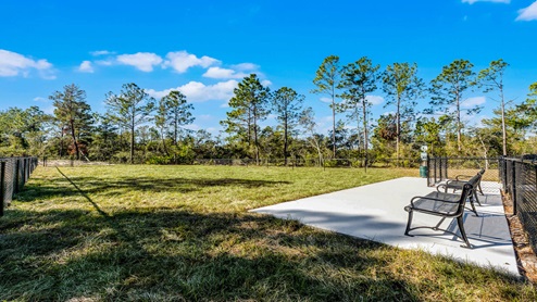 Aerial view of the community amenity area with blue skies and sidewalks