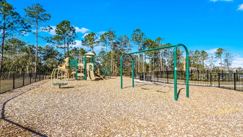 Aerial view of the community amenity area with blue skies and sidewalks