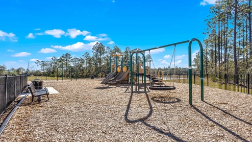 Aerial view of the community amenity area with blue skies and sidewalks