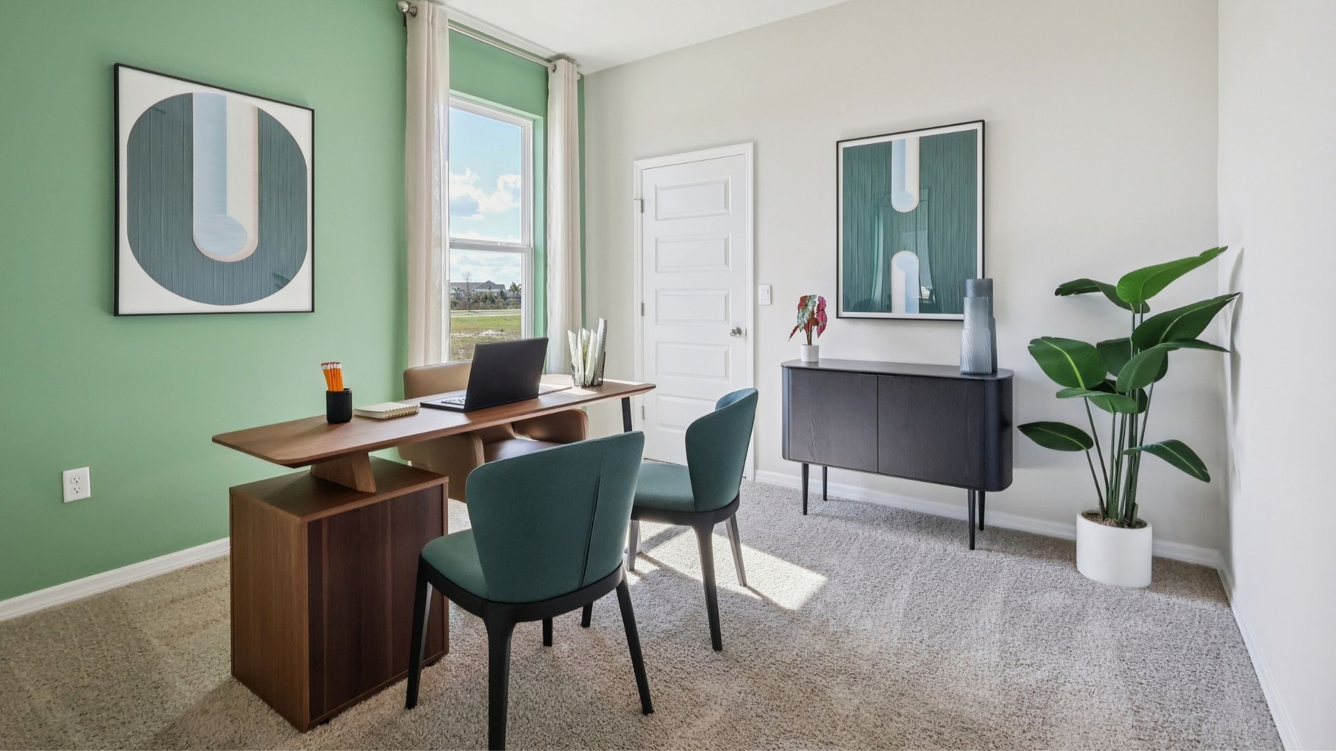 Functional home office with desk, chairs and space to work or play.