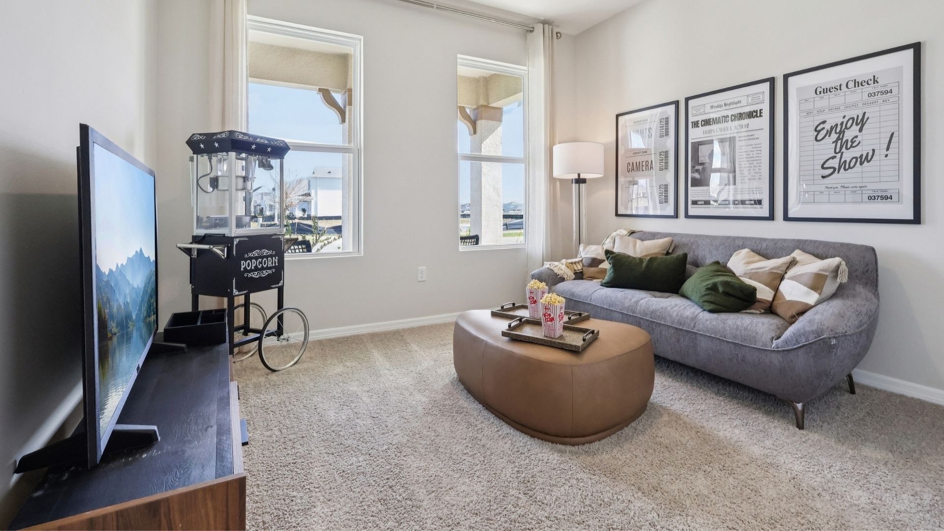 Functional home office with desk, chairs and space to work or play.