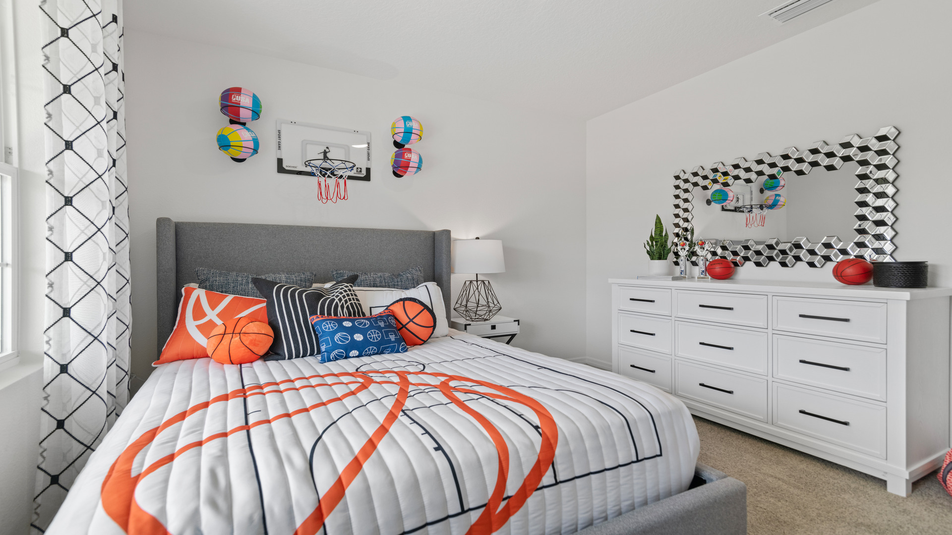 Guest bedroom with bed, nightstands and a roomy closet for storage.