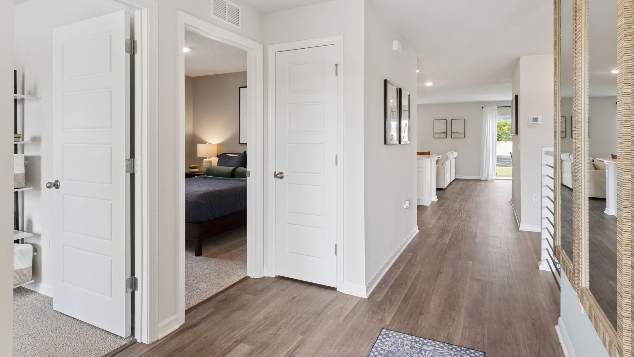 Home entry way thru the front door with tile flooring and front door.