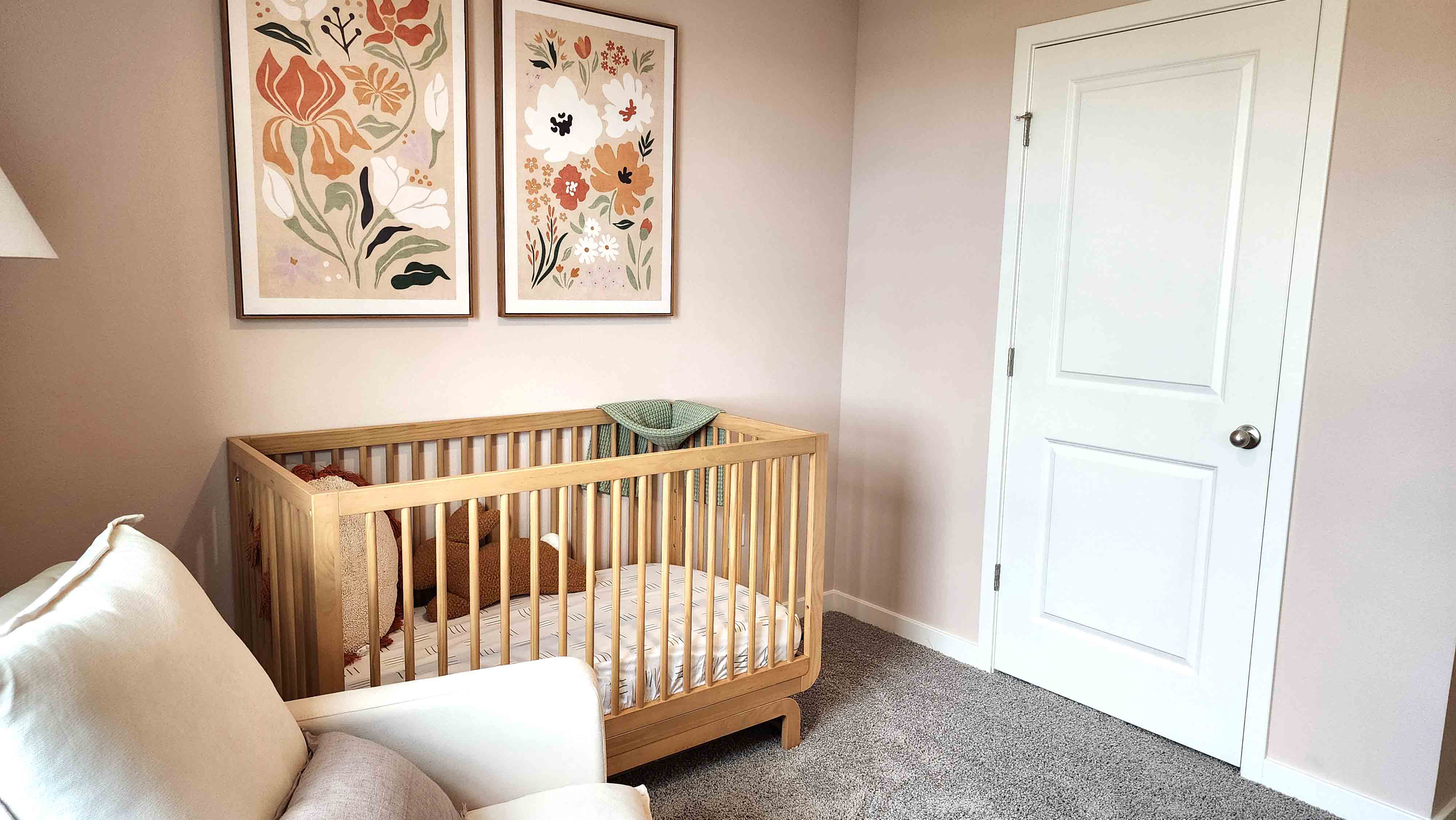 Guest bedroom with bed, nighstands and natural lighting.