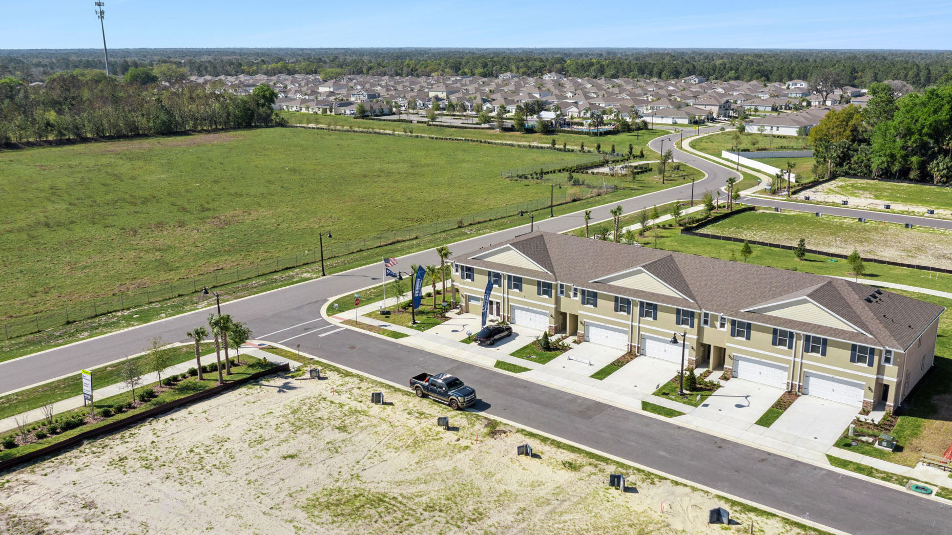 Attached townhome with concrete block construction and a one-car garage.