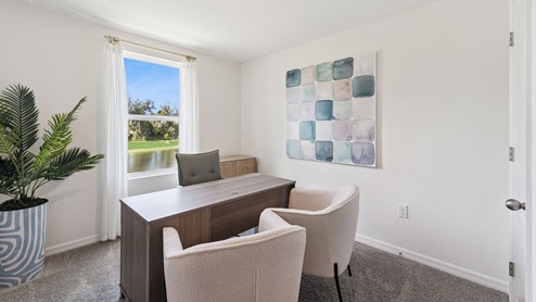 Office with desk and chairs