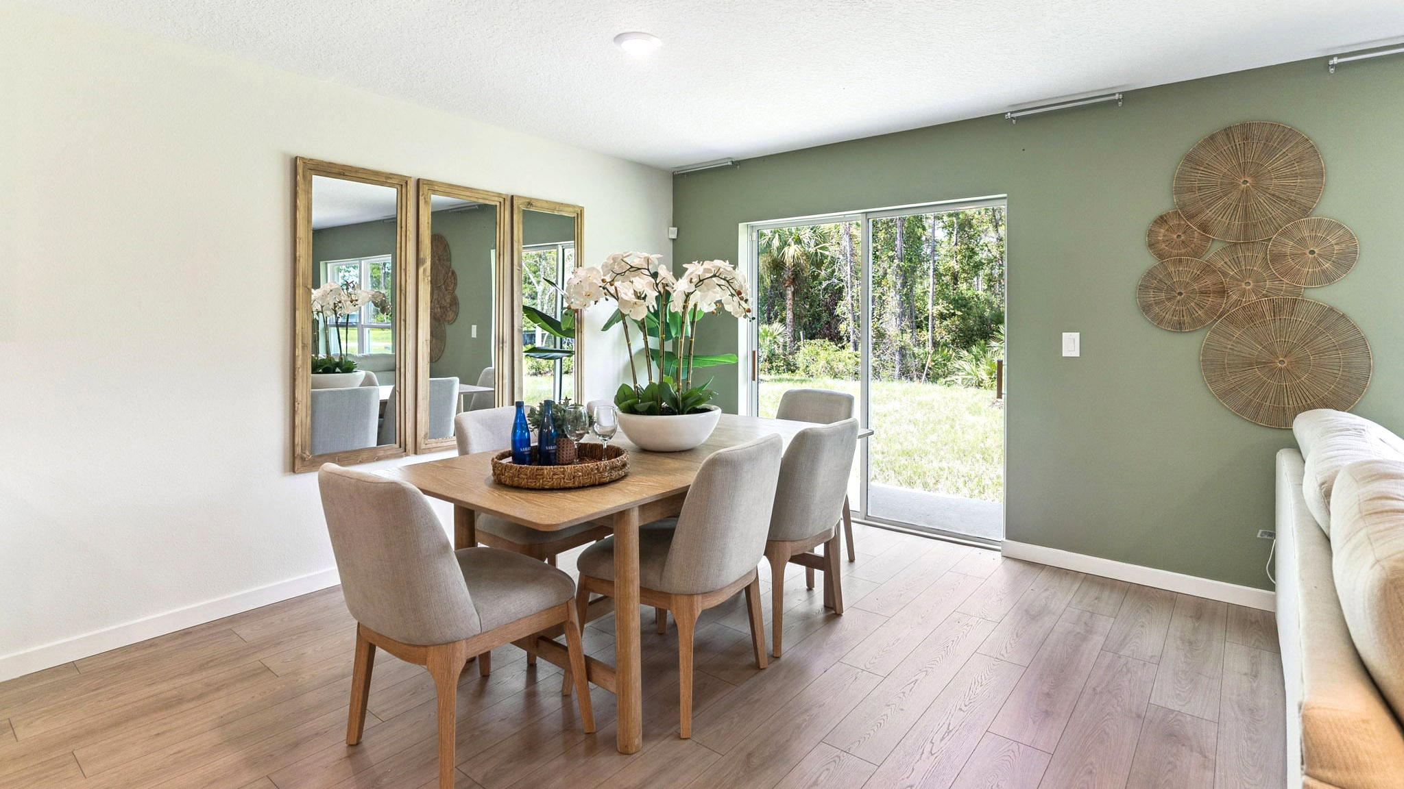 dining room table with seating by entry way