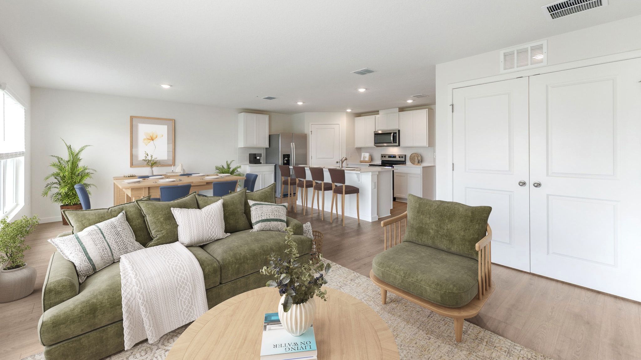 living area with couch seating anddining room