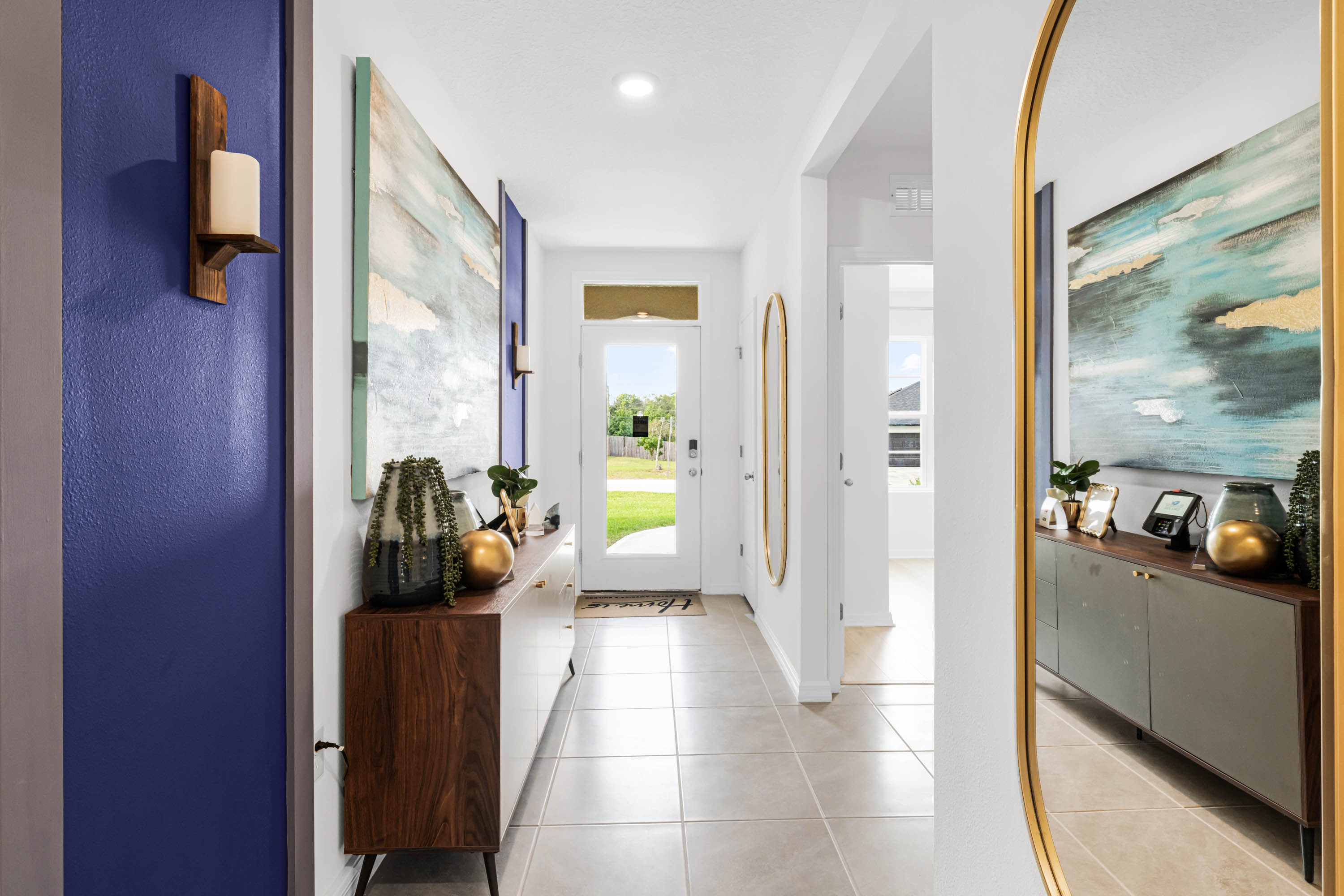 Front door entrance to the home, with access to bedrooms and living space.