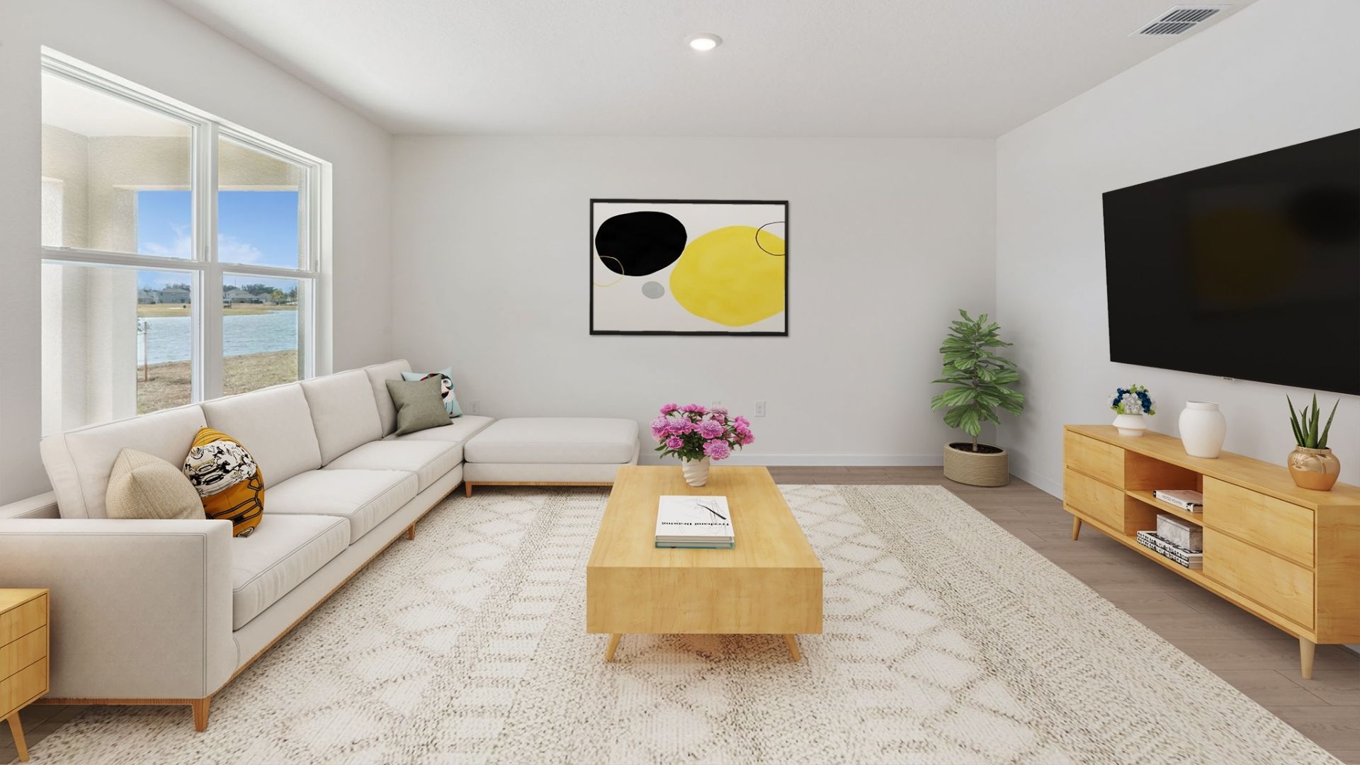 Living area with couch seating, entertainment system and natural lighting