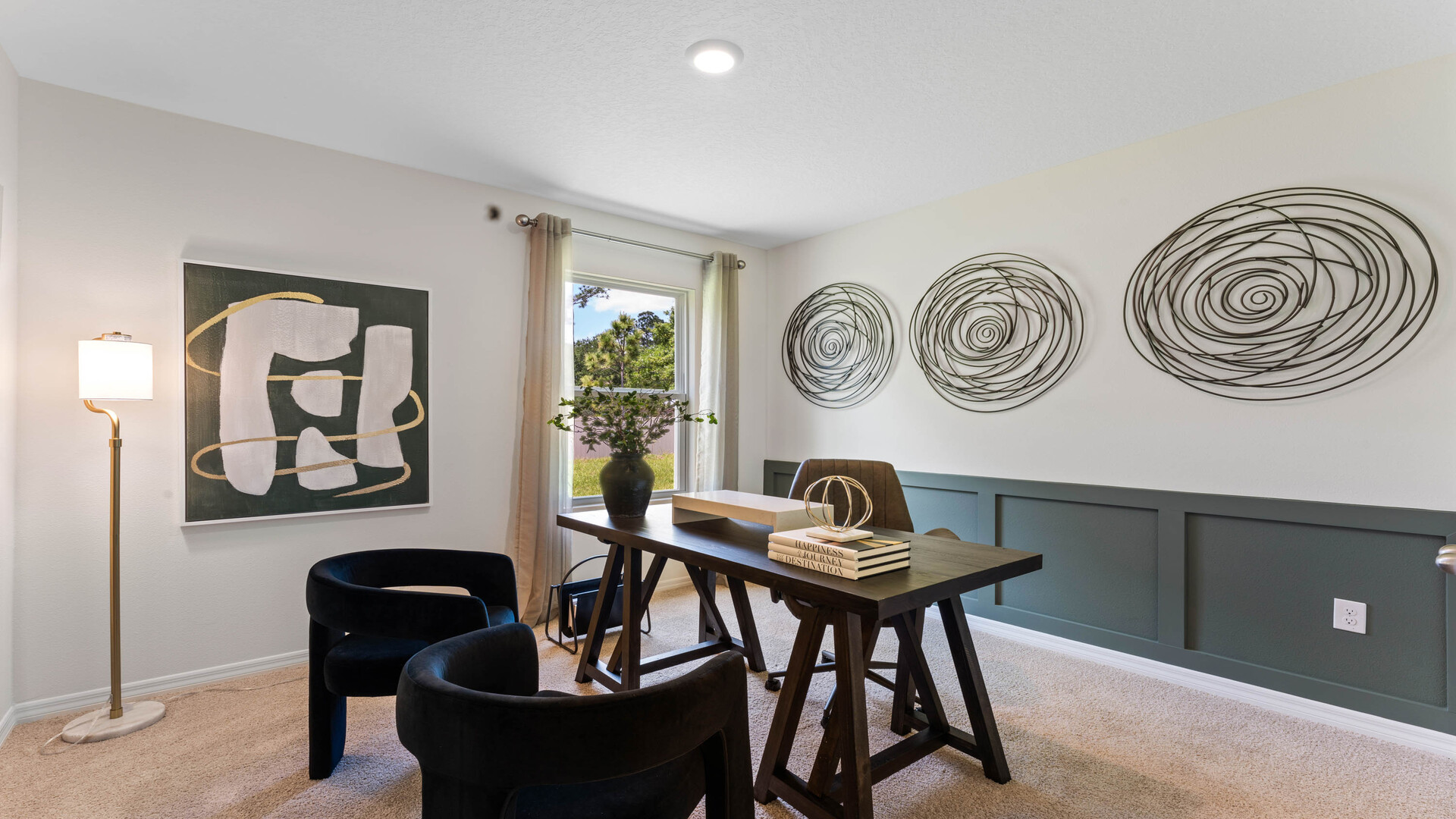 Functional home office with desk, chairs and space to work or play.