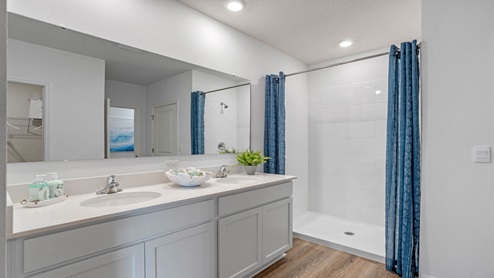 bathroom with quartz counters