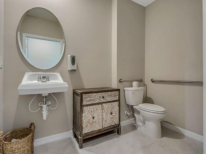Master bathroom showing access to private lavatory, walk-in closet, and master bedroom.