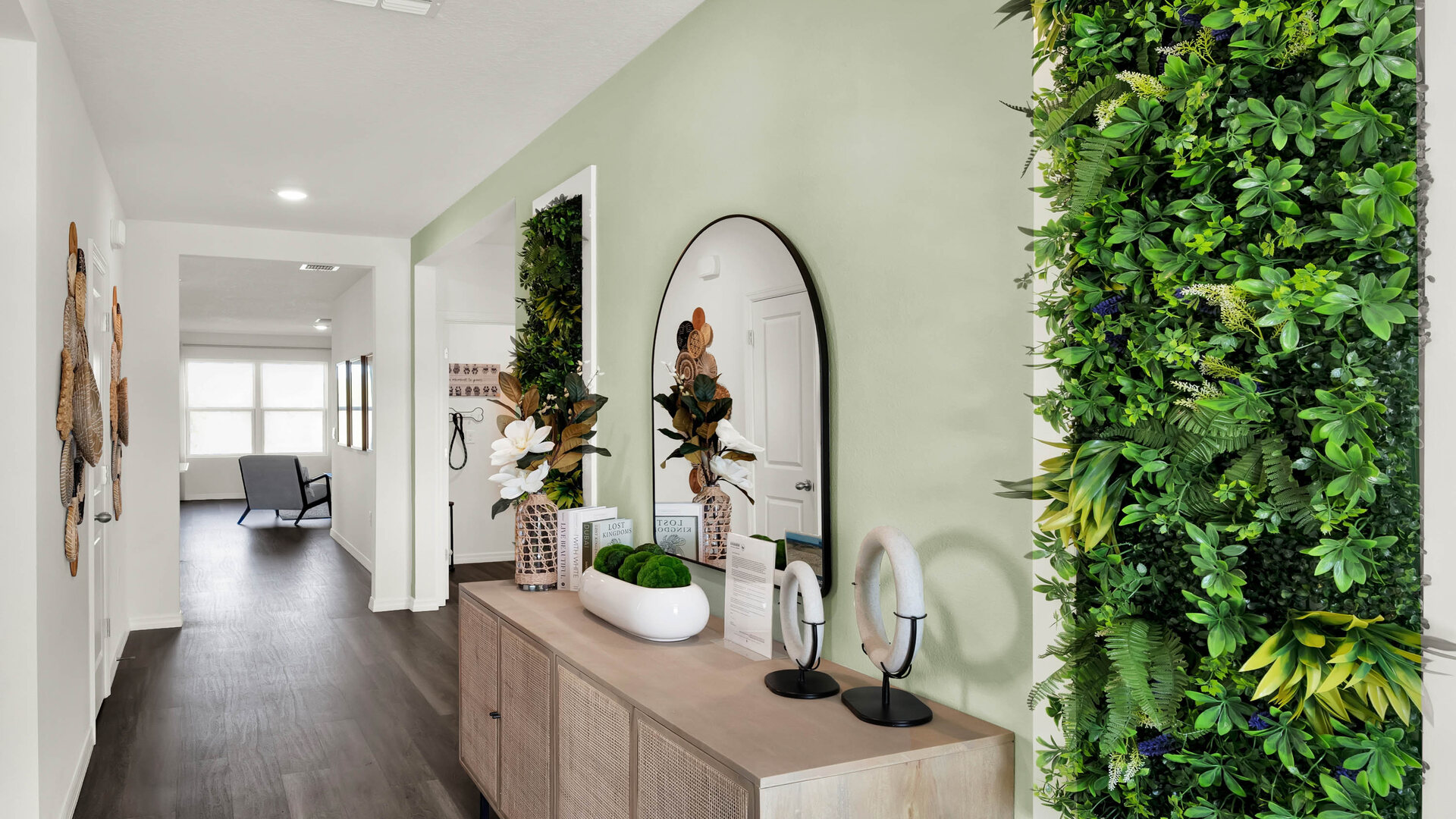 Home entry way through the front door with Luxury vinyl plank flooring.