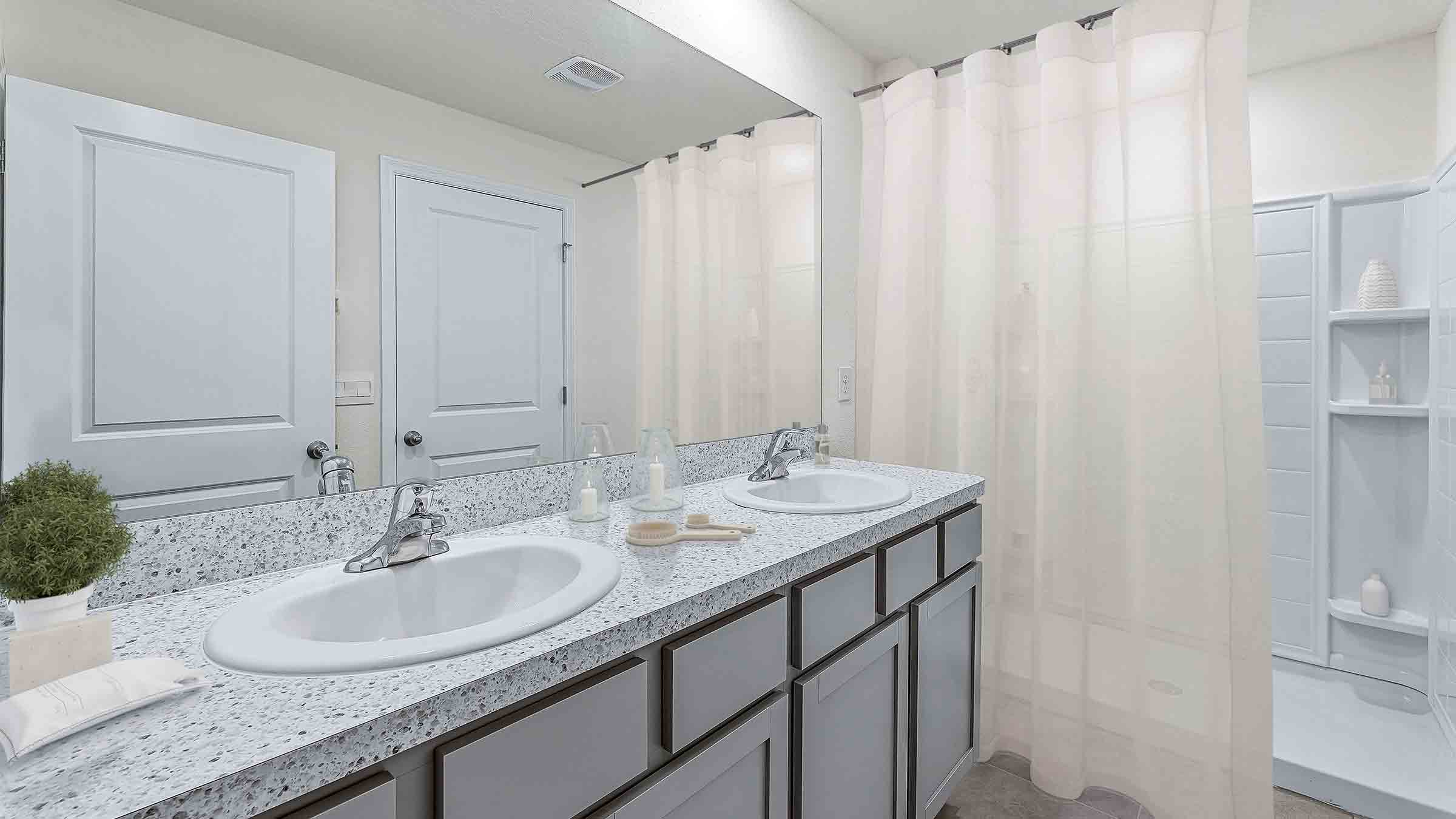 Darwin ensuite bathroom with double vanity and quartz countertops