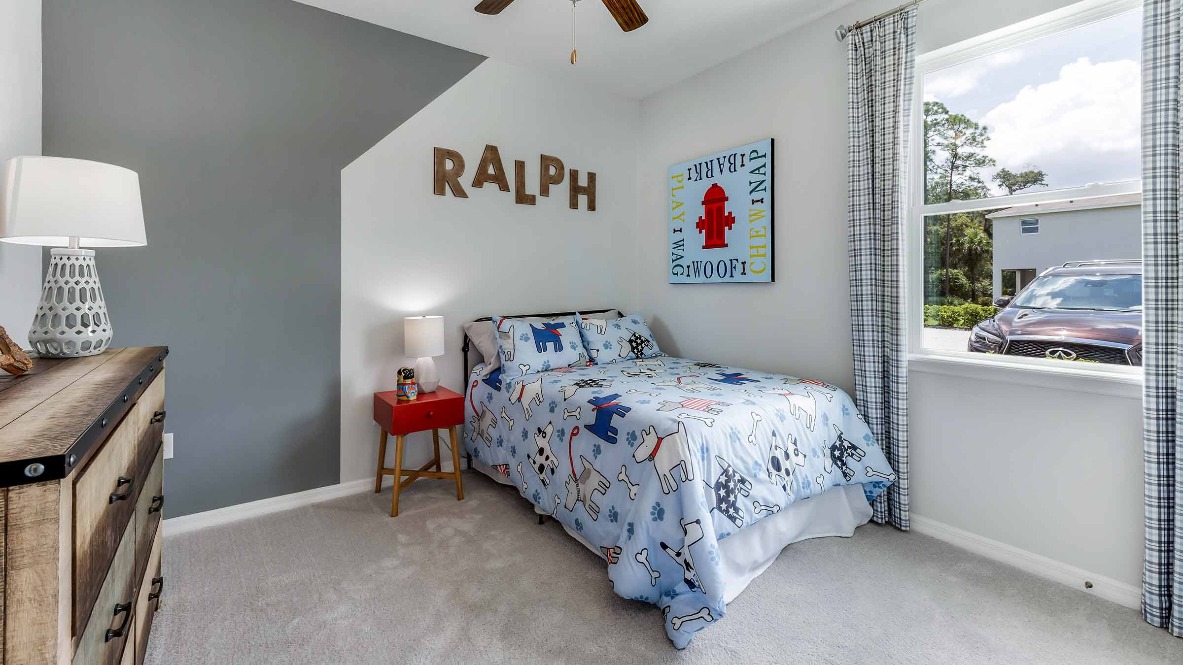 Bedroom with gray décor and ceiling fan