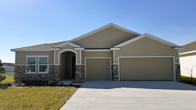 single-story exterior with brown siding and front window and garage