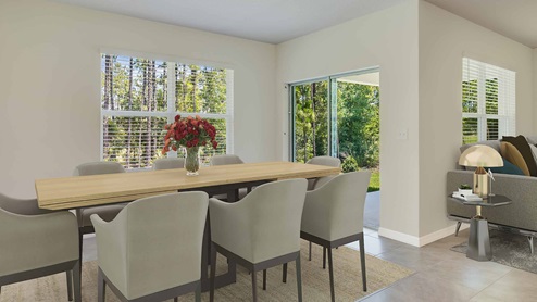 Aria dining room leading to the outdoor covered lanai