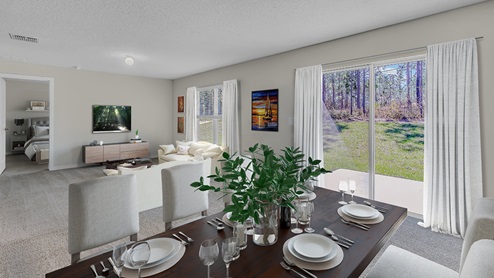 Dining area with sliding patio door