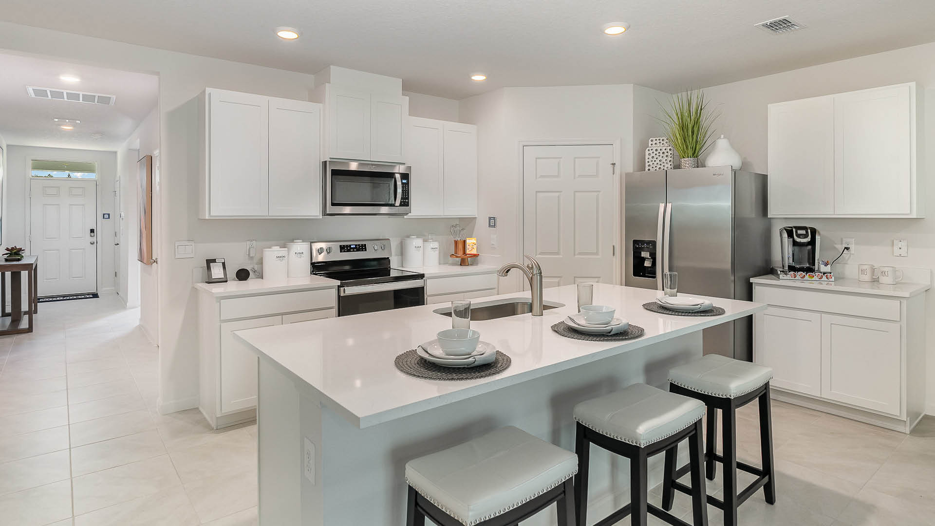 Kitchen island with barstools
