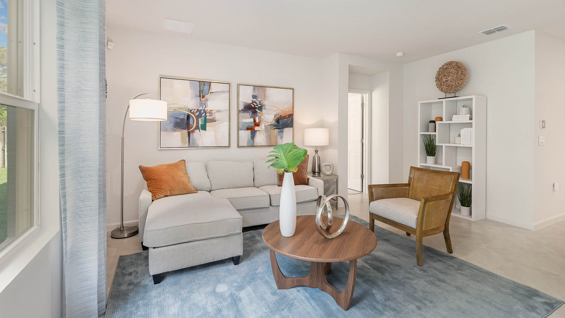 Living room with light blue rug