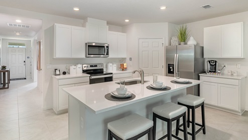 Cali Kitchen with White Cabinets and Stainless Appliances