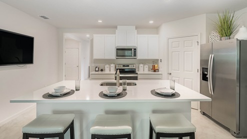 Cali Kitchen with White Cabinets and Stainless Appliances