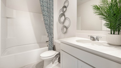 Cali Bathroom with white cabinets
