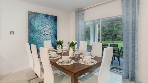 Cali Dining Room with Sliding Glass Doors leading to patio
