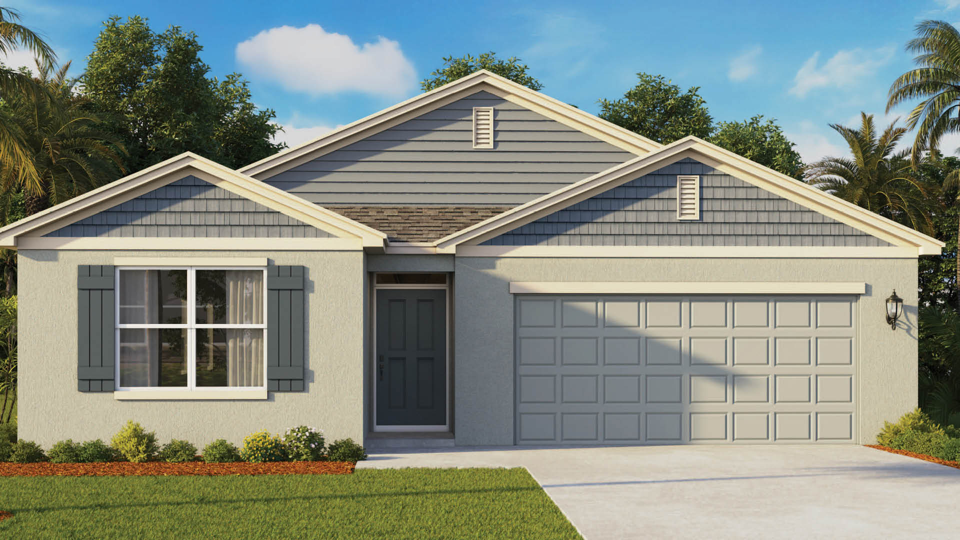 Front view of a modern single-story home with a light green exterior, gabled roof and two car garage.