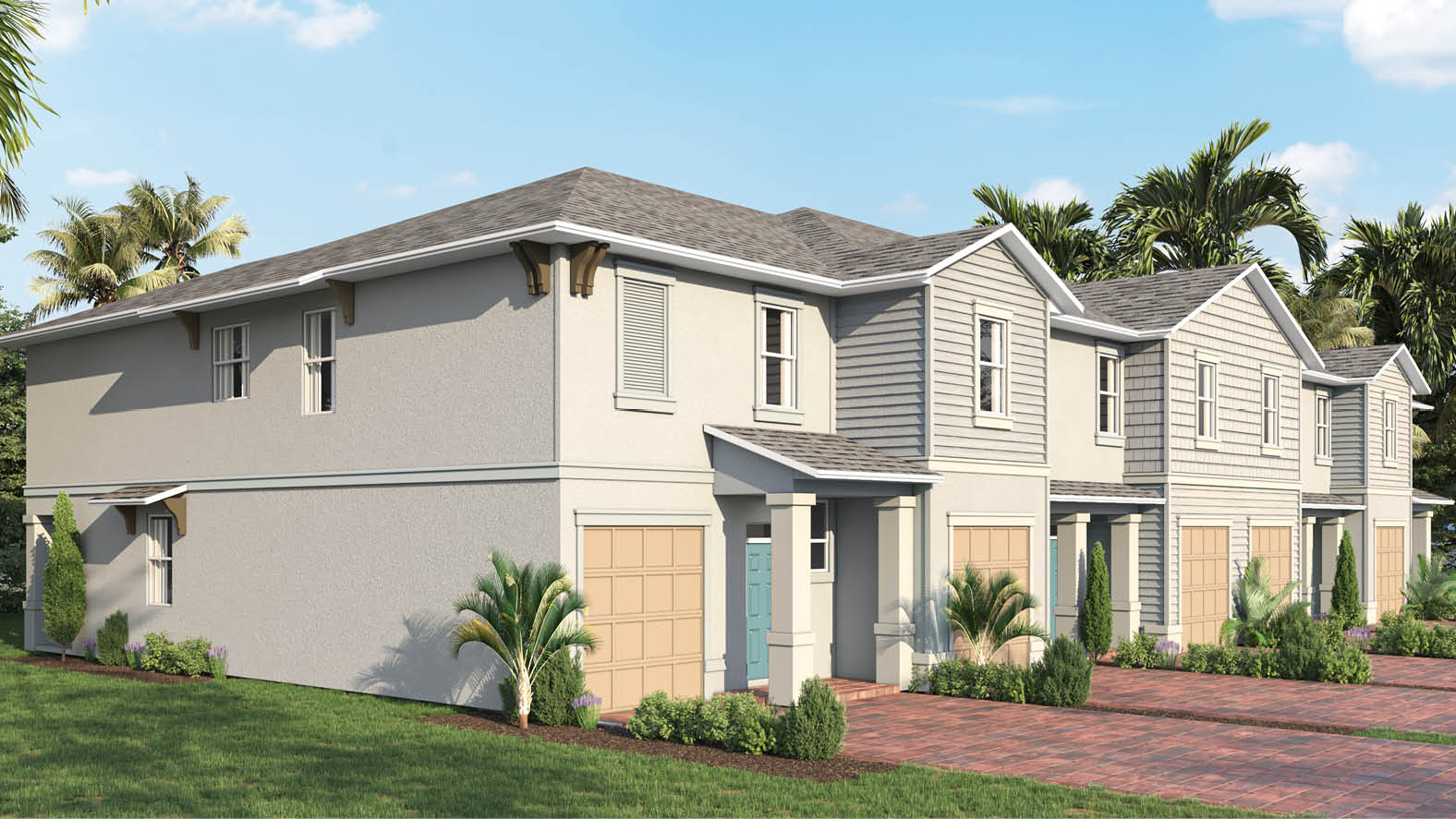 An exterior photo showing a modern townhome with a shingled roof and manicured landscaping under a blue sky.