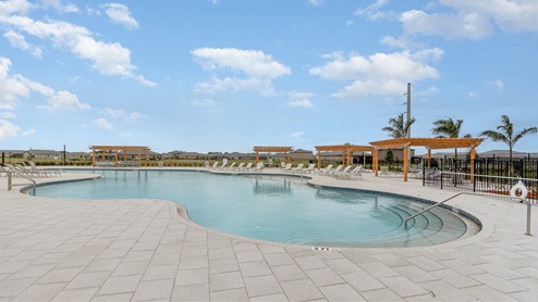Close up view of the Resort-Style Swimming Pool with plenty of seating
