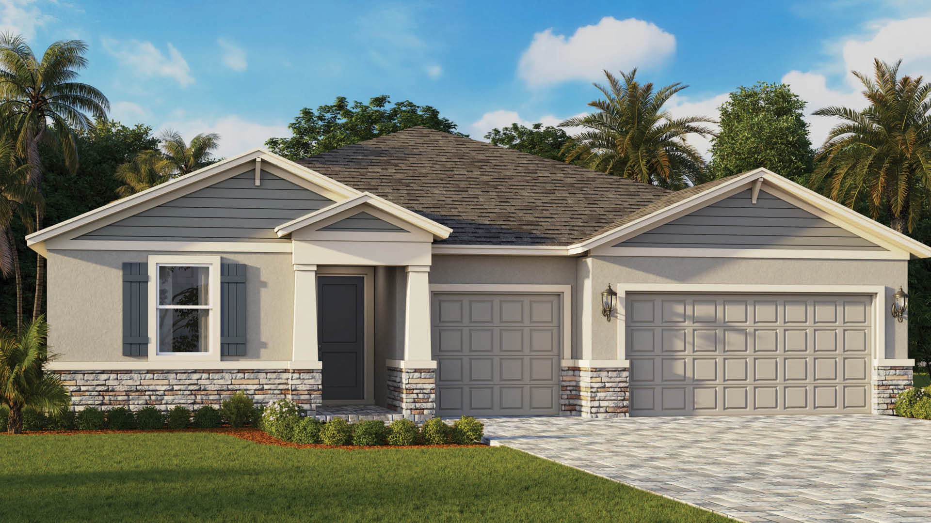 A modern single-story house with grey siding, stone accents, and three car garage with paver driveway.