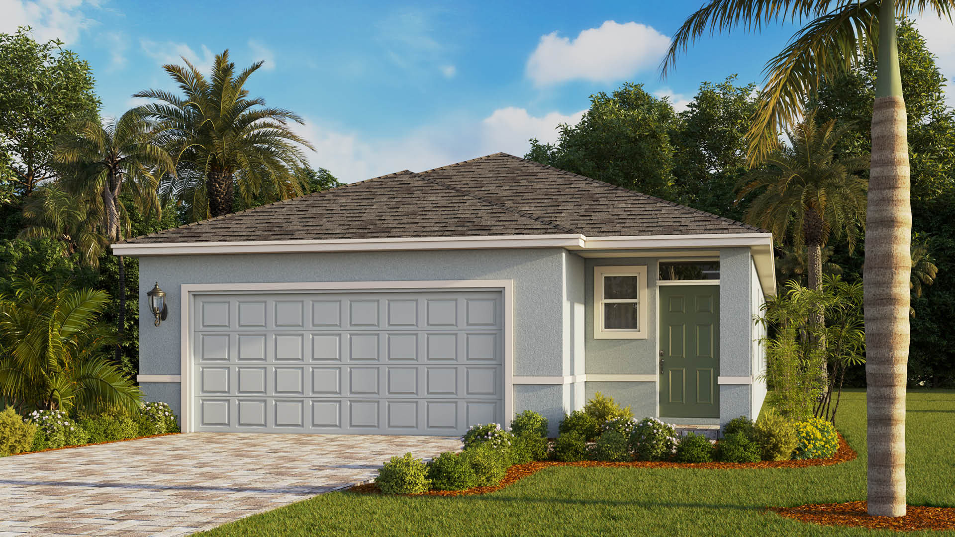 A light blue house with a gray garage door, green front door, and paver driveway.