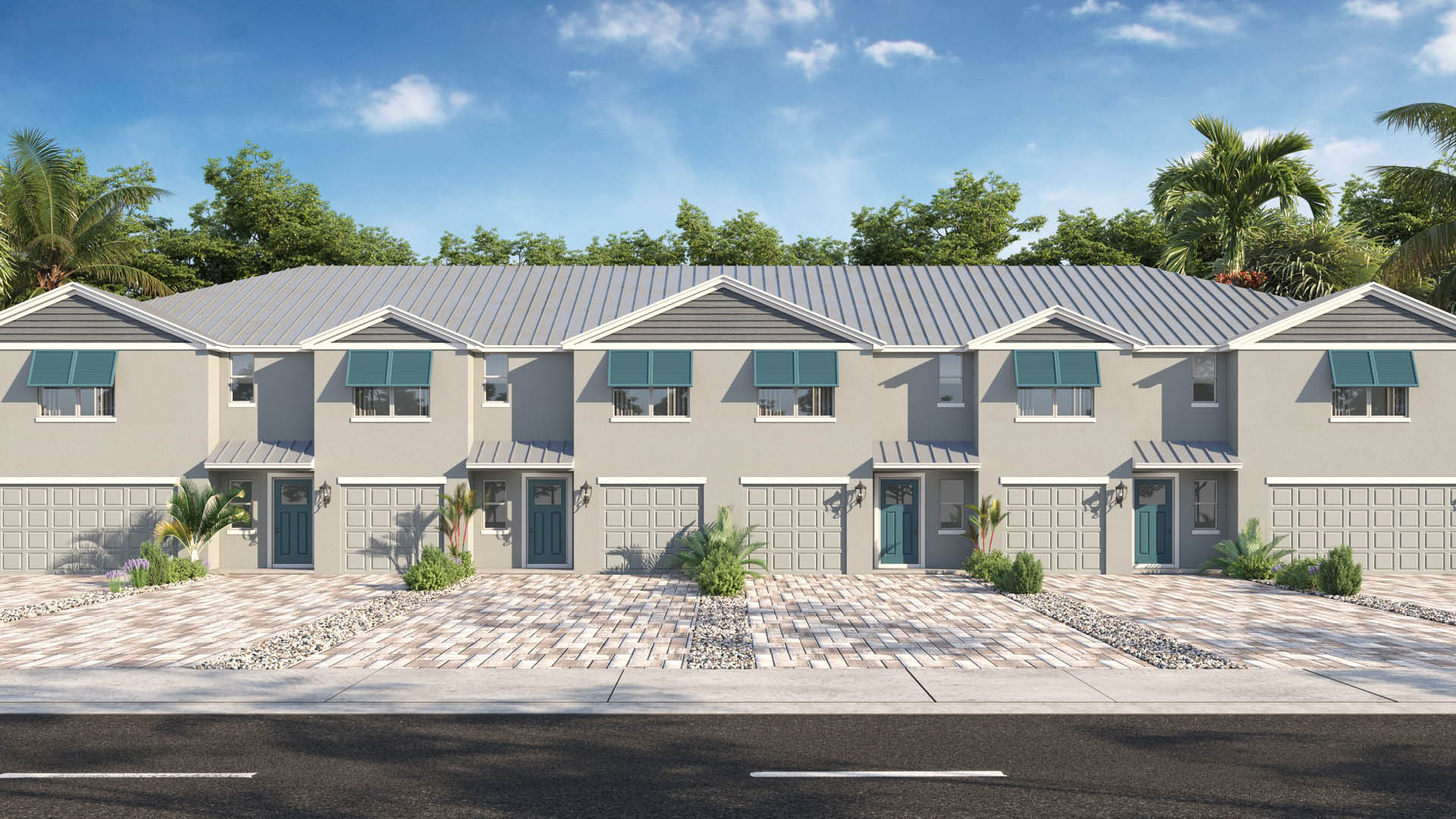 Two-story townhome with metal roof, teal shutters and two-car garage.