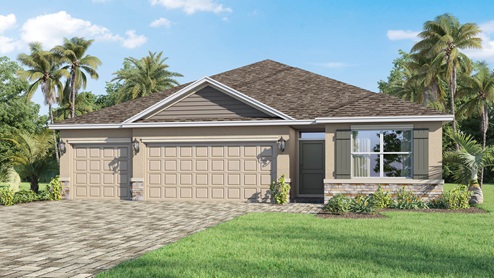 A beige-colored single-story home with a three car garage, green shutters and paver driveway.